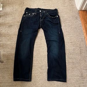 Barely worn true religion dark blue jeans. Straight size 30(32 waist 30 length)